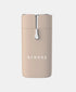 A nude colour hair removal tool with metallic detail.